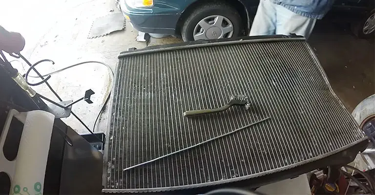 What causes a busted radiator
