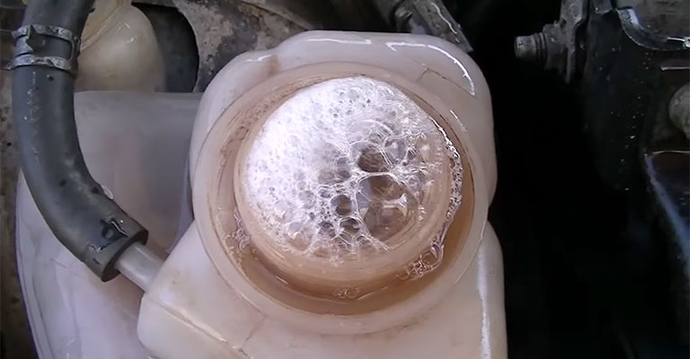 Why is Coolant Bubbling in Reservoir?