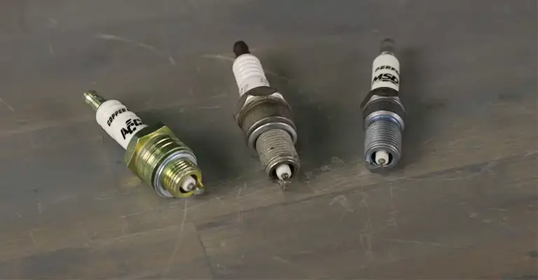 Installing the wrong types of spark plugs